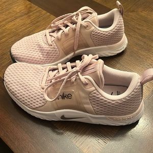 Light pinkish Nikes Size 9